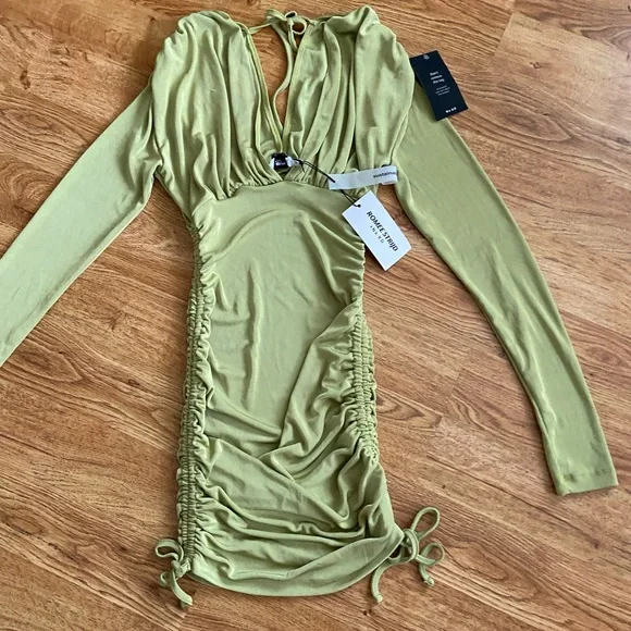 slim fit dress slacks NA-KD Green Rib Knitted Trumpet Sleeve Dress (SZ L) – elleandava main image 0